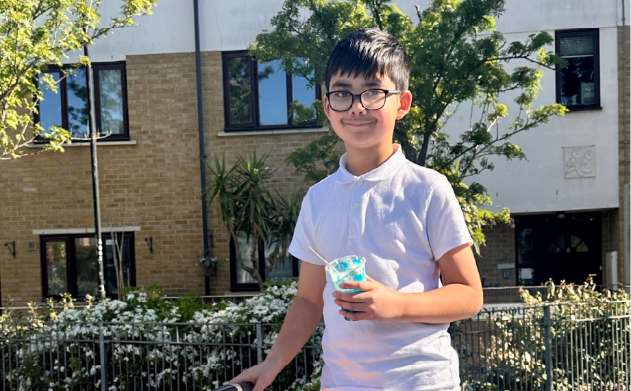 Young person smiling on the drop in event